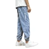 Men's spring and autumn jeans, a trendy Japanese loose-fitting and casual style with a halun leg, a trendy nine-inch corset Item Picture